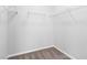 Empty walk-in closet with simple shelving at 1019 Santiago St, Durham, NC 27703