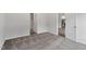 Bedroom featuring carpet, white trim, neutral walls, and ample natural light at 102 Flue Ct, Oxford, NC 27565