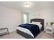Comfortable bedroom with a queen-sized bed, neutral decor, and soft carpeting at 103 Foothill Ct, Sanford, NC 27330