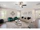 Inviting living room showcasing stylish furnishings, decor, and hardwood floors at 103 Foothill Ct, Sanford, NC 27330