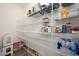 Walk-in pantry with wire shelving for organized storage of food, drinks, and kitchen supplies at 103 Foothill Ct, Sanford, NC 27330
