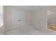Neutral bedroom featuring plush carpet, large closet, and a bright window for natural lighting at 1040 Ivy Ln, Cary, NC 27511