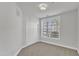 Bright bedroom featuring a window, plush carpet and a closet at 10511 Sablewood Dr # 107, Raleigh, NC 27617