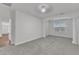 Spacious room with gray carpet and open entryway at 10511 Sablewood Dr # 107, Raleigh, NC 27617
