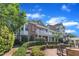 Brick townhomes with balconies and lush landscaping provide a welcoming community ambiance at 10511 Sablewood Dr # 107, Raleigh, NC 27617
