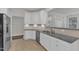 Updated kitchen featuring stainless steel appliances, granite countertops, and tiled backsplash at 10511 Sablewood Dr # 107, Raleigh, NC 27617
