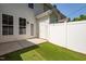 Backyard area featuring a fenced perimeter, grassy space, and convenient home access at 1076 Kelso Ln, Burlington, NC 27215