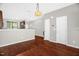 Inviting living room showcasing wood floors, fresh paint, and an open floor plan at 1076 Kelso Ln, Burlington, NC 27215