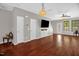 Comfortable living room with hardwood flooring, ceiling fan, and neutral wall color at 1076 Kelso Ln, Burlington, NC 27215