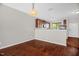 Bright, open-concept living room featuring hardwood floors and recessed lighting at 1076 Kelso Ln, Burlington, NC 27215