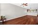 Spacious living room featuring hardwood floors, light paint, and an open floor plan at 1076 Kelso Ln, Burlington, NC 27215
