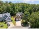 This aerial view shows a well-maintained home with a two-car garage at 110 Bonhill Ct, Apex, NC 27502