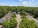 Neighborhood view featuring lovely landscaped yards and mature trees, showcasing a serene and picturesque community at 110 Bonhill Ct, Apex, NC 27502