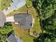 Aerial view of a home highlighting the backyard with patio and fire pit at 110 Bonhill Ct, Apex, NC 27502