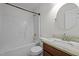 This bathroom features a tub with shower, a toilet, and a granite countertop sink at 110 Bonhill Ct, Apex, NC 27502