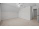 This bedroom boasts neutral carpet, a ceiling fan, and a closet at 110 Bonhill Ct, Apex, NC 27502