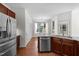 Modern kitchen with stainless steel appliances and plenty of cabinets at 110 Bonhill Ct, Apex, NC 27502