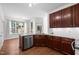 Well-equipped kitchen with stainless steel dishwasher and ample counter space at 110 Bonhill Ct, Apex, NC 27502