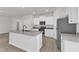 Modern kitchen featuring stainless steel appliances, granite countertops, and ample white cabinetry at 111 Rhino Bnd, Oxford, NC 27565