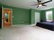 Large bedroom with great natural light from two large windows and a ceiling fan at 1122 Birkdale Dr, Mebane, NC 27302