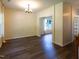 Bright dining room featuring hardwood floors, elegant lighting, and view to yard through large windows at 1122 Birkdale Dr, Mebane, NC 27302