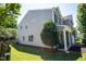 This home features tidy landscaping, vinyl siding, and a quaint porch perfect for relaxing outdoors at 1122 Birkdale Dr, Mebane, NC 27302