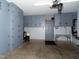 Garage interior with many cabinets for storage at 1122 Birkdale Dr, Mebane, NC 27302