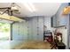 Spacious garage with ample built-in storage cabinets and garage door opener at 1122 Birkdale Dr, Mebane, NC 27302
