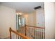 Upstairs hallway featuring neutral colored walls and carpeted floors at 1122 Birkdale Dr, Mebane, NC 27302