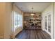 Bright bonus room with built in shelves, large windows and french doors; perfect for a library or office at 1122 Birkdale Dr, Mebane, NC 27302