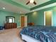 Large main bedroom with tray ceiling, carpeted floor, and windows at 1122 Birkdale Dr, Mebane, NC 27302