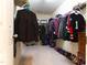 Spacious walk-in closet with ample storage, hanging racks, and room for shoes at 1122 Birkdale Dr, Mebane, NC 27302