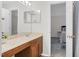 Bathroom with vanity and sink leading to an adjacent bedroom at 1203 First Street Ext, Nashville, NC 27856
