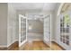 Bedroom with an open doorway, neutral carpet, and natural light from outside at 12257 Beestone Ln, Raleigh, NC 27614