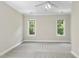 Neutral carpet and walls create a calm atmosphere in this airy bedroom at 12257 Beestone Ln, Raleigh, NC 27614