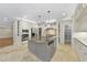 Gourmet kitchen with a kitchen island, stainless steel appliances, and pantry at 12257 Beestone Ln, Raleigh, NC 27614