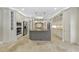 Gourmet kitchen with center island, stainless steel appliances, and custom cabinetry at 12257 Beestone Ln, Raleigh, NC 27614