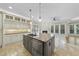 Spacious kitchen with an island and stainless steel appliances at 12257 Beestone Ln, Raleigh, NC 27614