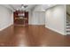 Finished basement with wood floors and a classic wet bar for entertaining at 12257 Beestone Ln, Raleigh, NC 27614