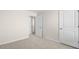 Bedroom features neutral colored walls and plush carpet at 132 Pisgah St, Sanford, NC 27330