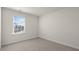Cozy bedroom with plush carpeting and bright natural light at 132 Pisgah St, Sanford, NC 27330
