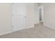 Bedroom features plush carpet and neutral colored walls at 132 Pisgah St, Sanford, NC 27330