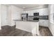 This kitchen features stainless steel appliances, granite countertops and breakfast bar at 132 Pisgah St, Sanford, NC 27330