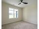 Bedroom with plush carpet, one window letting in natural light, and electrical outlets at 1328 Bethlehem Church Rd, Youngsville, NC 27596