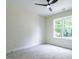 Bedroom featuring neutral carpet, a modern ceiling fan, and one window for natural light at 1328 Bethlehem Church Rd, Youngsville, NC 27596
