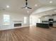 Spacious living room with a fireplace, vaulted ceilings, and an open floorplan at 1328 Bethlehem Church Rd, Youngsville, NC 27596