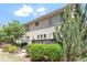 Beautiful backyard with a lush garden, wooden deck, and brick patio perfect for outdoor living at 1413 Lily Creek Dr, Cary, NC 27518