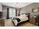 Bedroom with a bed, fan, and bike decor at 1413 Lily Creek Dr, Cary, NC 27518