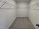 The walk-in closet includes white shelving units at 154 N Finley Landing Pkwy, Smithfield, NC 27577