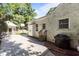Backyard showing patio, basketball hoop, shed, and access to the house, and a grill at 1811 Ridley St, Raleigh, NC 27608